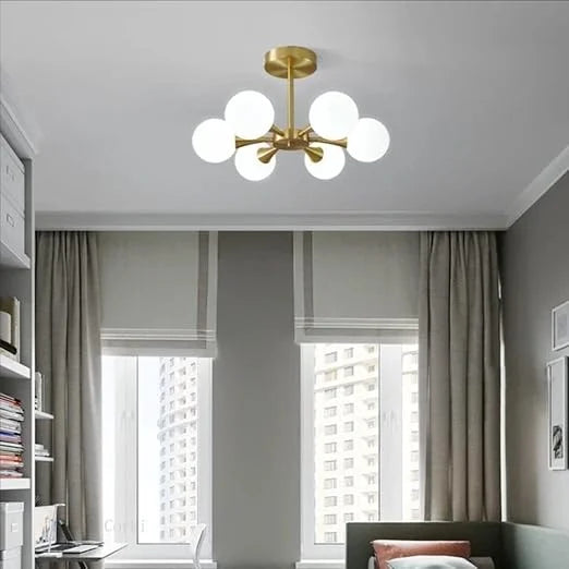 Homes Elite  Modern Globe Chandelier – 8-Light Brass Ceiling Fixture with White Glass Shades