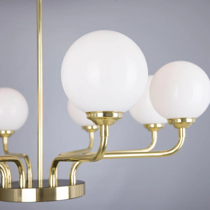 Homes Elite 8-Light Globe Chandelier – Modern Gold Brass Finish with White Glass Shades for Living & Dining Room